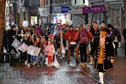Photo of lantern parade heading up Bailey Street