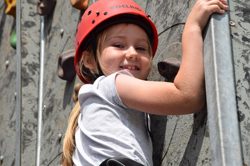 Child on a climbing wall